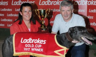Angela Harrison and Jimmy Wright pose for a photo with Droopys Buick in 2017
