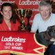 Angela Harrison and Jimmy Wright pose for a photo with Droopys Buick in 2017