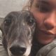 Abbey Steels trainer cuddles one of her greyhounds at the Noir Racing Kennels.
