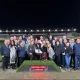 Tony Collett and friends pose for a photo at Central Park upon Tony's retirement