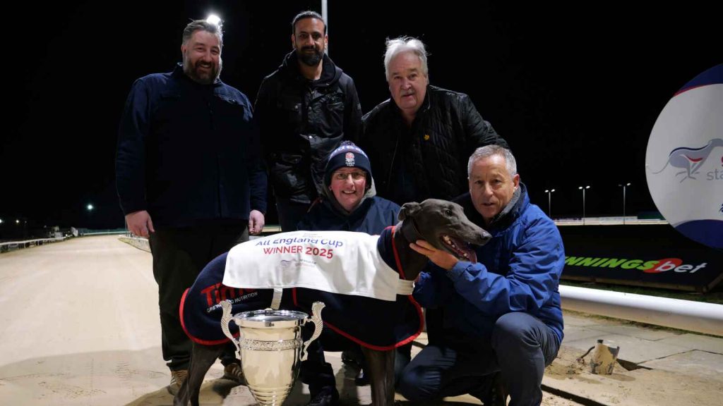 Trainer David Mullins with Santas Amigo after winning the PGR All England Cup
